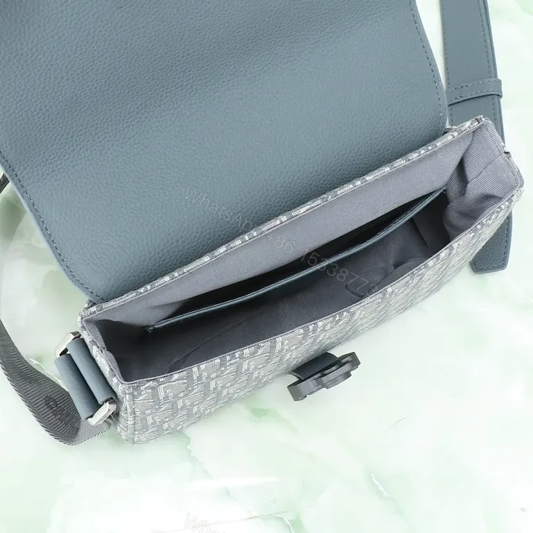 View 3 of Chic Texture Messenger Bag: Premium Pebble Leather Portable Tech