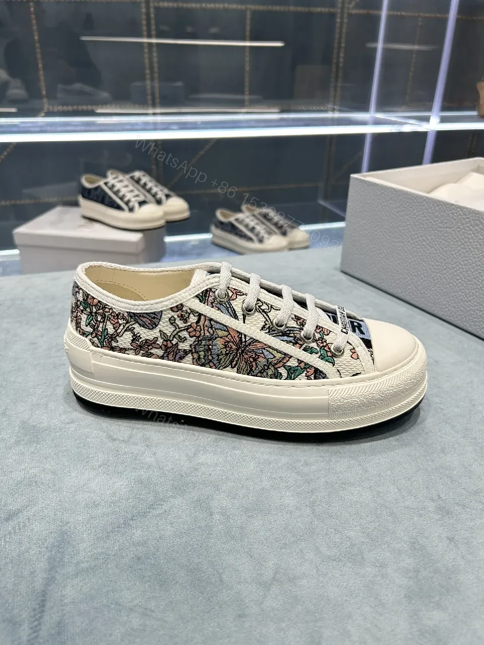 View 3 of Street-Chic Dior-Print Low-Top Sneakers