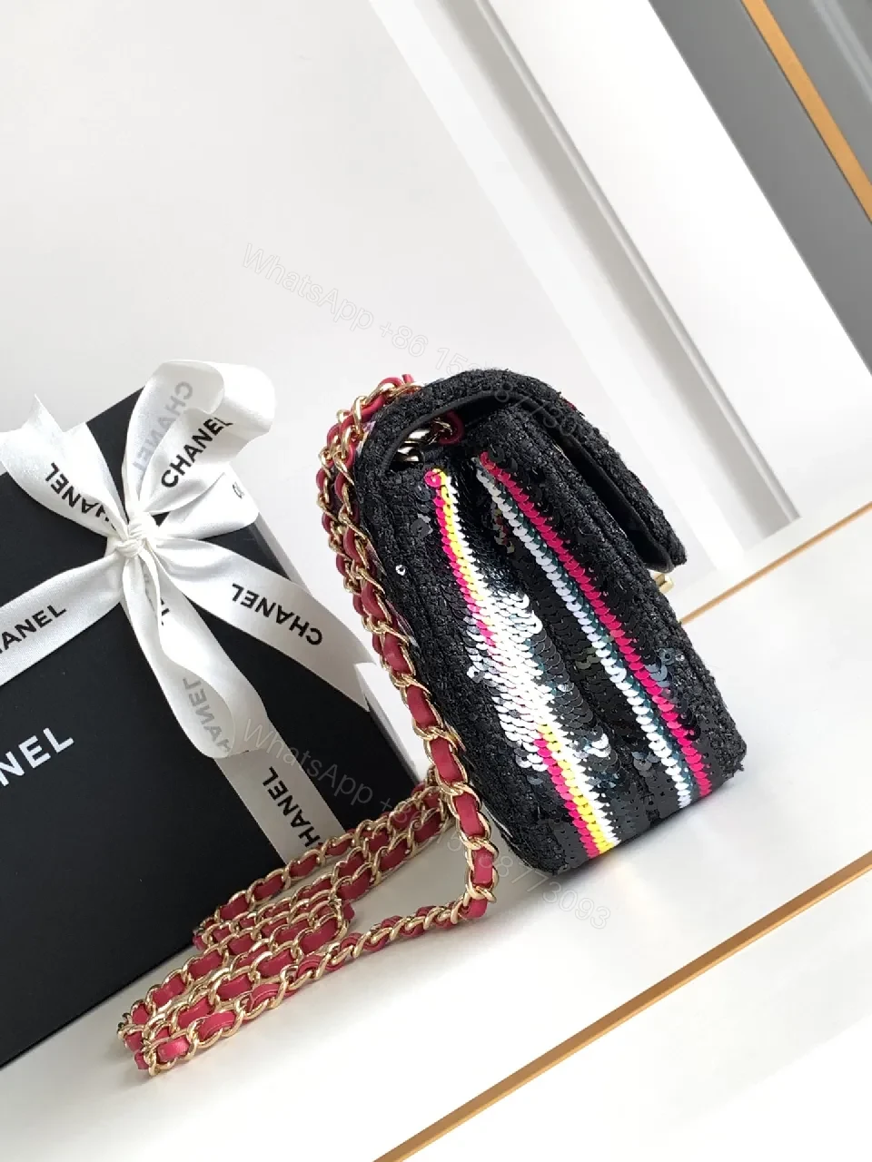 View 4 of Colorful Tweed Crossbody Bag: Compact Luxury in Striped Style
