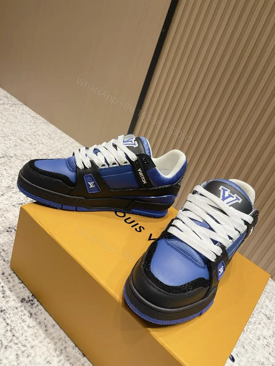 View 7 of Textured Blue-Black Leather High-Tops with Bold Detailing