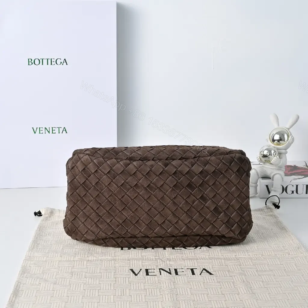 View 2 of brown woven leather hobo bag with intrecciato texture for everyday luxury
