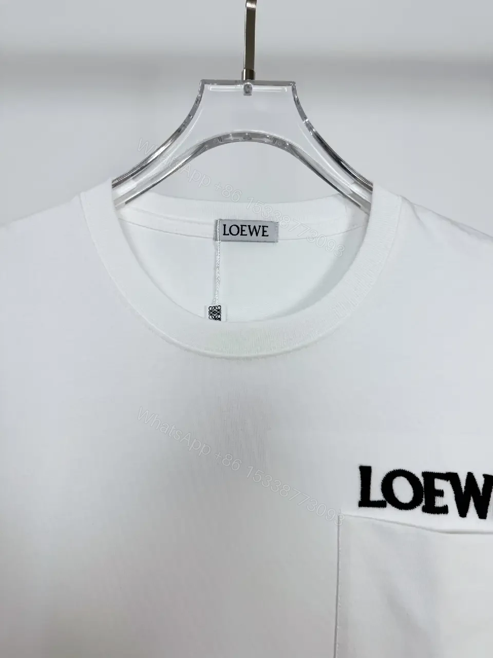 View 3 of Minimalist White Cotton Tee with Bold Pocket, Everyday Luxury Top