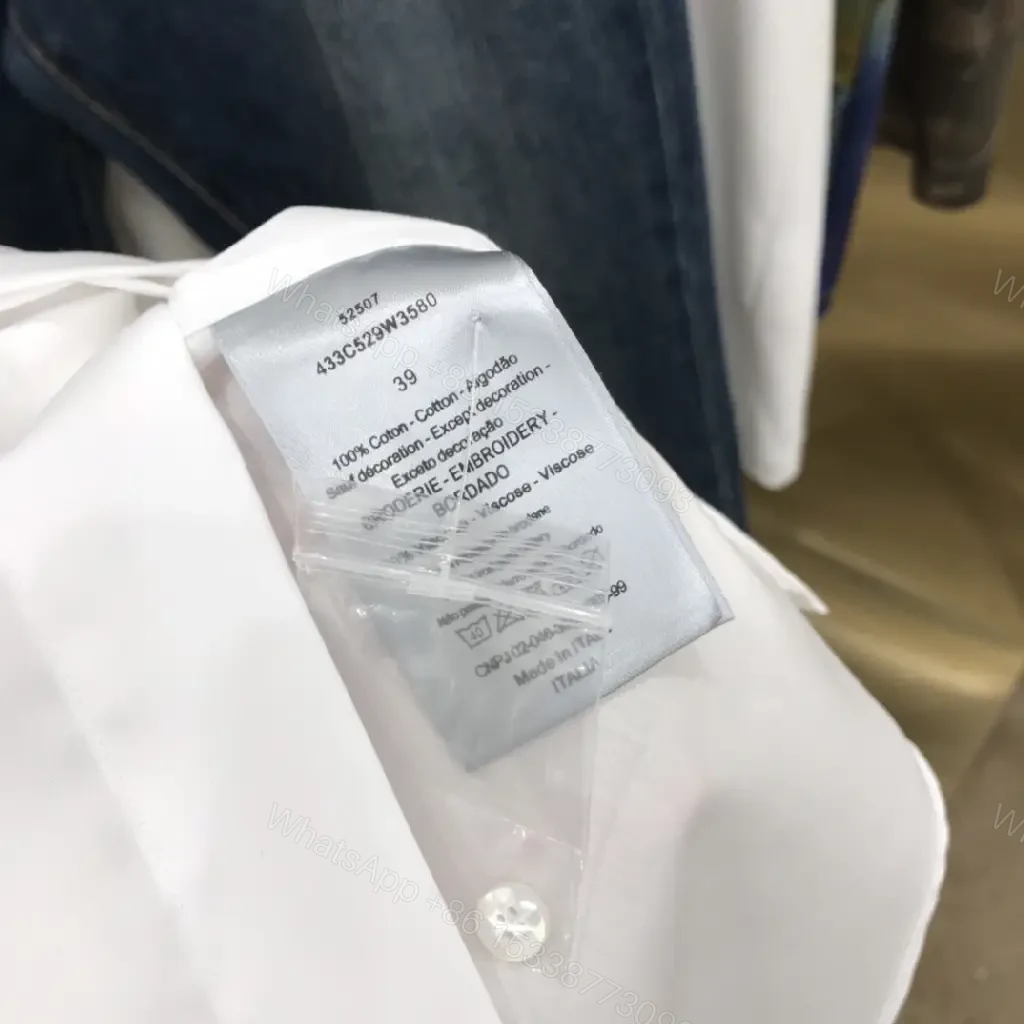View 8 of White Cotton Shirt with Minimal Dior Emblem, Relaxed Fit, Crisp Look