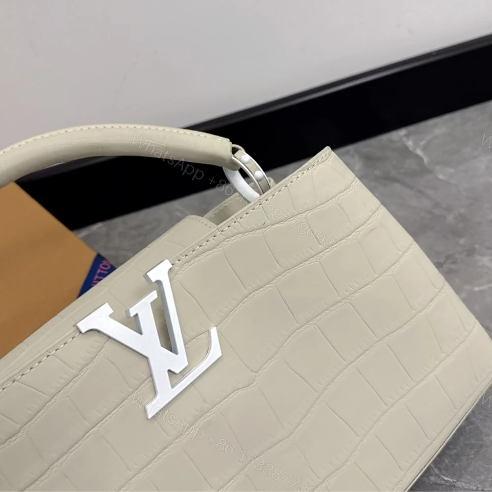 View 4 of Louis Vuitton Capucines MM East West In Grey 33Cm