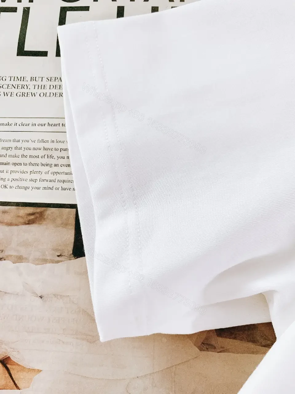 View 6 of White Cotton Tee + Subtle Logo Embellishment + Luxe Casual + Elevated Detail + T-Shirt