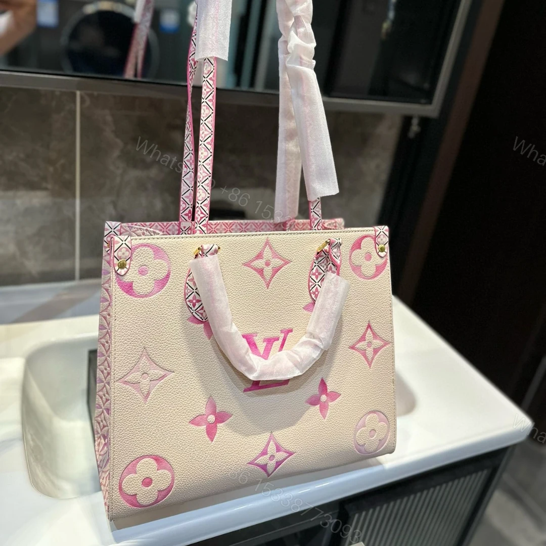 View 2 of LOUIS VUITTON BY THE POOL ON THE GO PM TOTE BAG PINK 34CM M22976