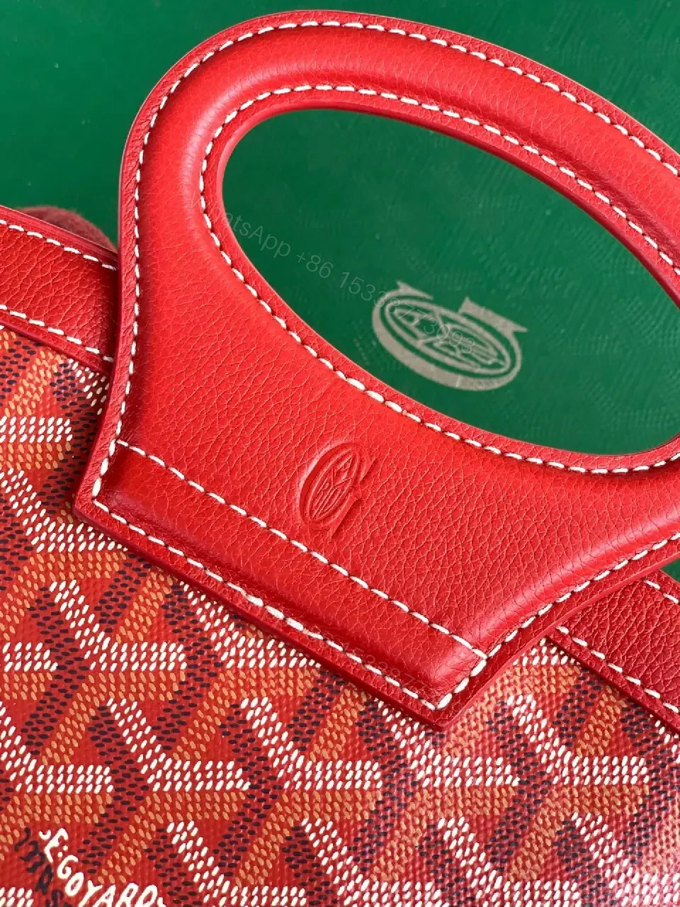 View 2 of Compact Luxury Handbag: Red Leather Trim, Iconic Pattern