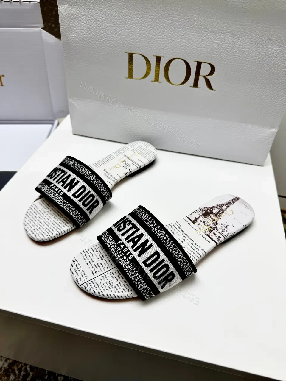View 5 of white textile slide sandal with monogram pattern luxury logo strap for everyday luxury