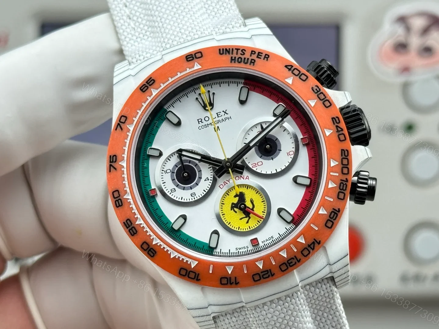 View 4 of Rolex Daytona Carbon Fiber White Replica 40MM Exclusive Orange Bezel White Fabric Strap R74 RG-ROLEX-DAYTONA-WHITE-DIAL