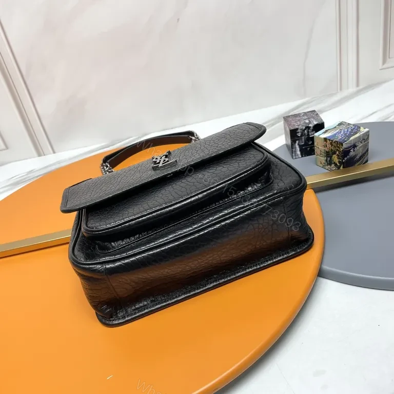 View 2 of Pebbled Leather Shoulder Bag â€“ Compact Luxury with Signature Hardware