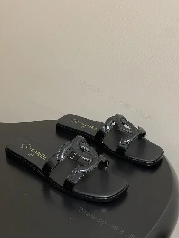 Chic Leather Sandals: Minimalist, Cushioned, Black, Unisex Slips-ons — view 1