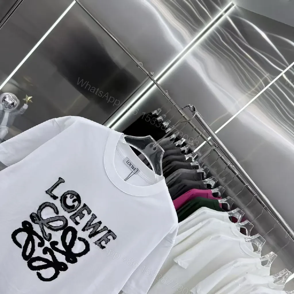 View 7 of Luxe Graphic Logo Tee – Elevated Statement Top