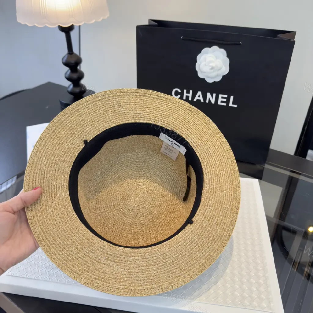 View 7 of Natural Tan Straw Boater Hat with Blue Polka Dot Band and Chanel Clasp