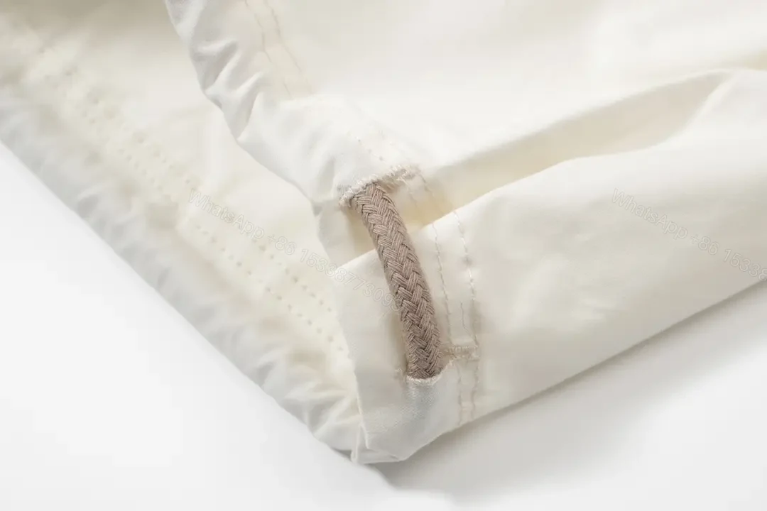 View 7 of Off-White Wide-Leg Cropped Pants with Elastic Drawstring Waist
