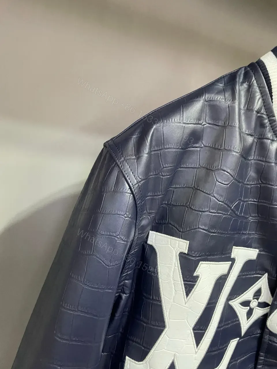 View 4 of Bold Navy Quilted Varsity Jacket with LV-Inspired Logo