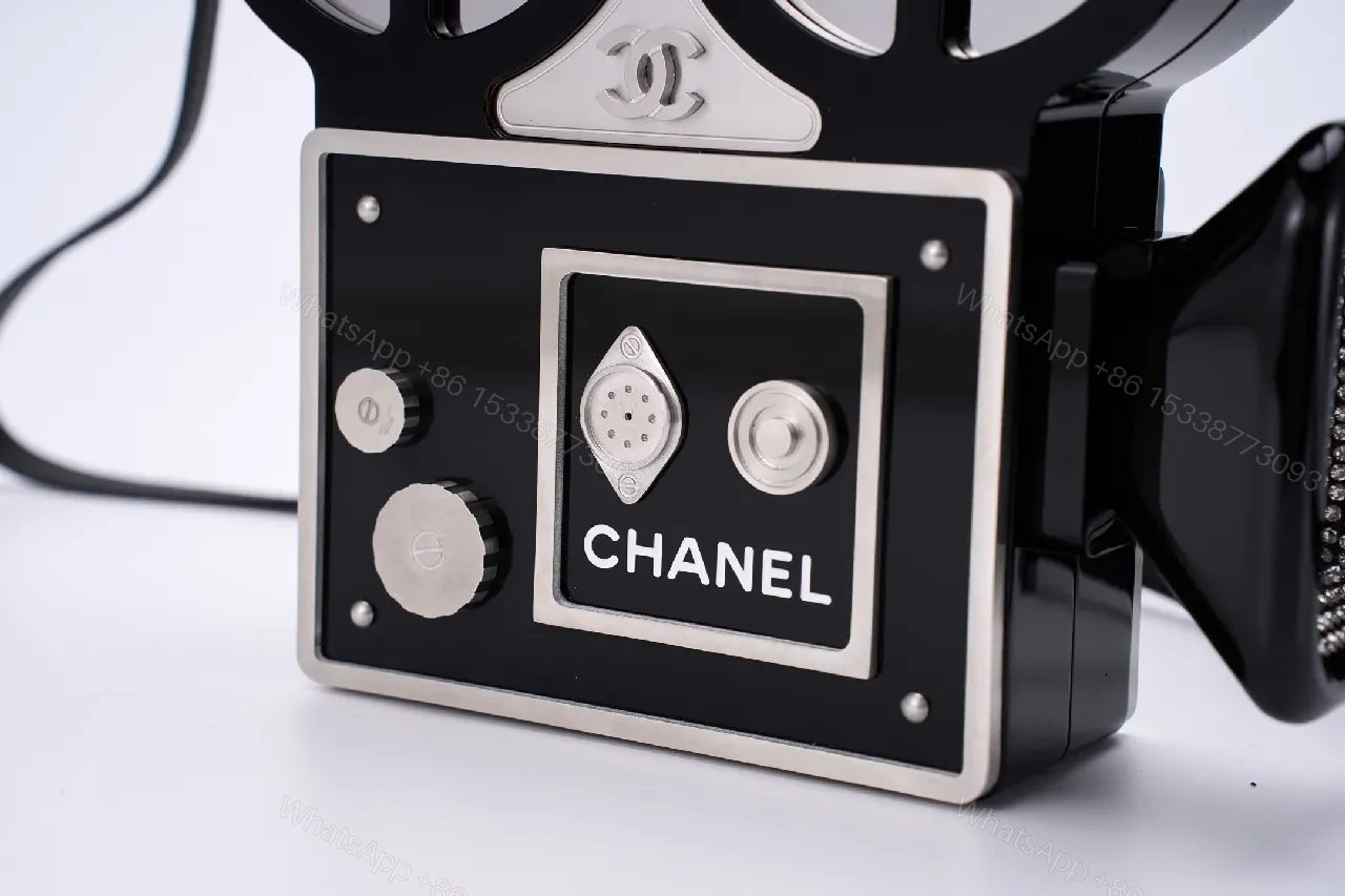 View 7 of Compact Reel-Clutch: Lux Gloss Hardware with Architectural Silhouette