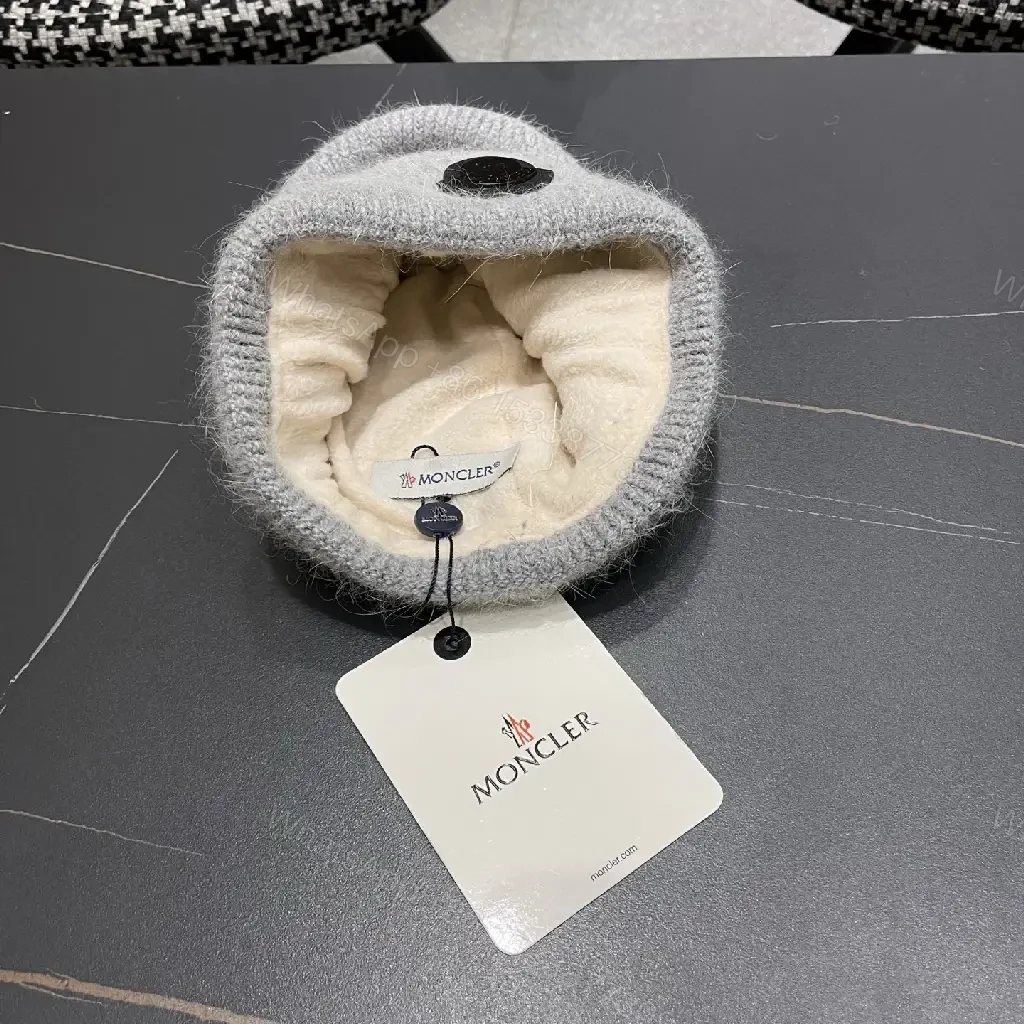 View 11 of Cozy Perimeter Beanie: Textured Knit, Subtle Emblem, Neutral Gray
