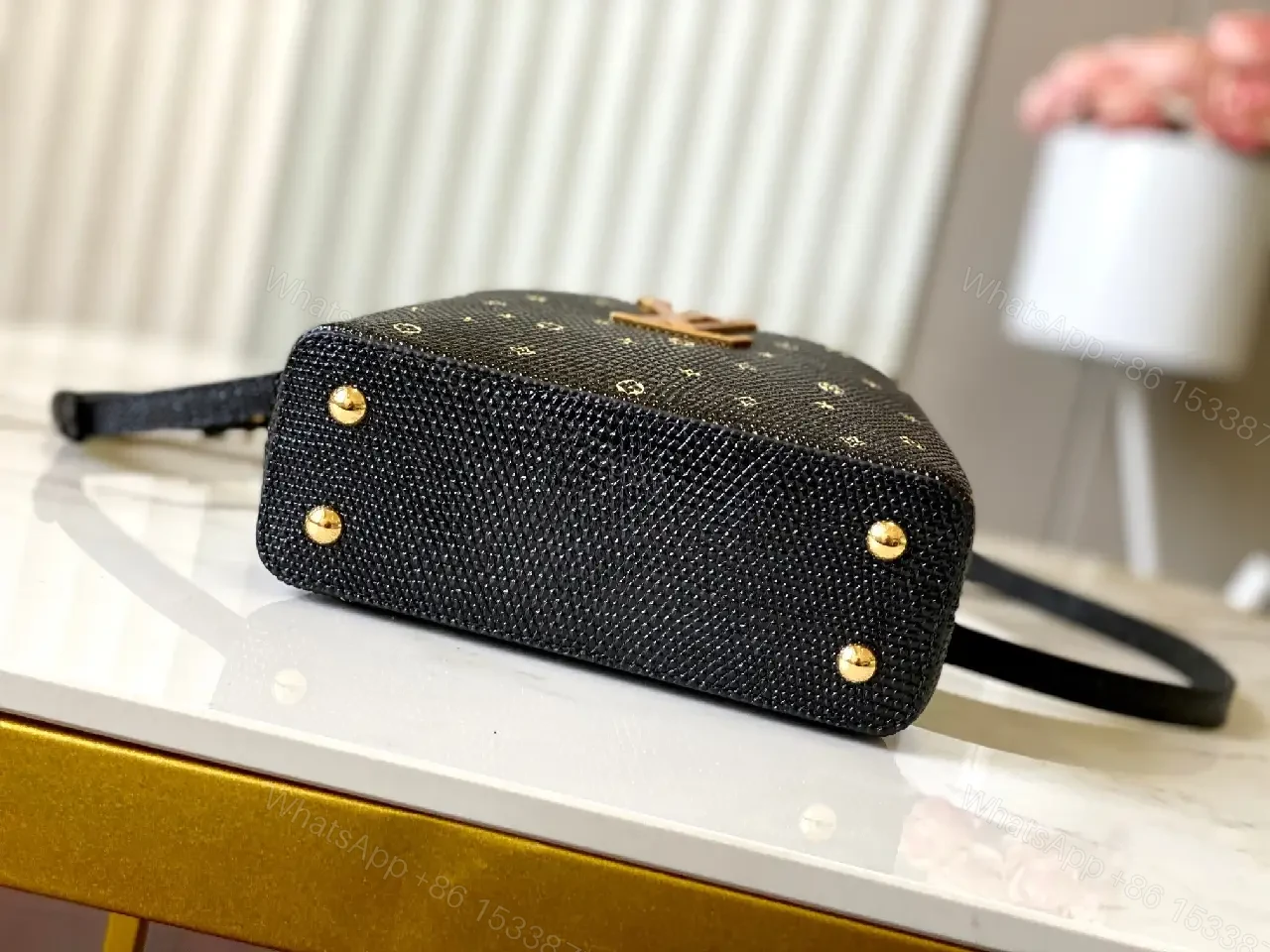 View 5 of Compact Black Pebble-Grain Top-Handle Bag with Gold Hardware