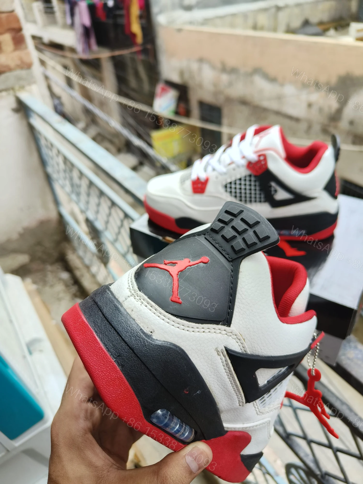 View 9 of BUY FIRST COPY NIKE JORDAN 4 “RED/WHITE” SNEAKERS
