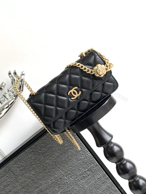 View 3 of Mini Quilted Black Chain Bag with Gold Logo â€” Luxury Silhouette