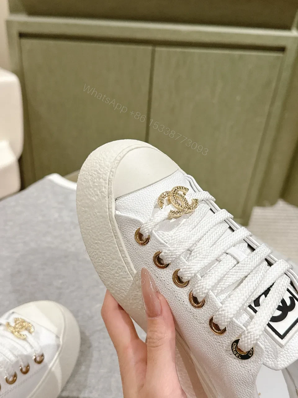 View 4 of White Leather High-Top Sneakers with Gold Accents