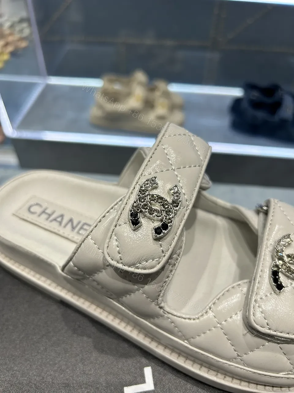 View 9 of Chic White Sandals with Quilted Straps and Logo Hardware