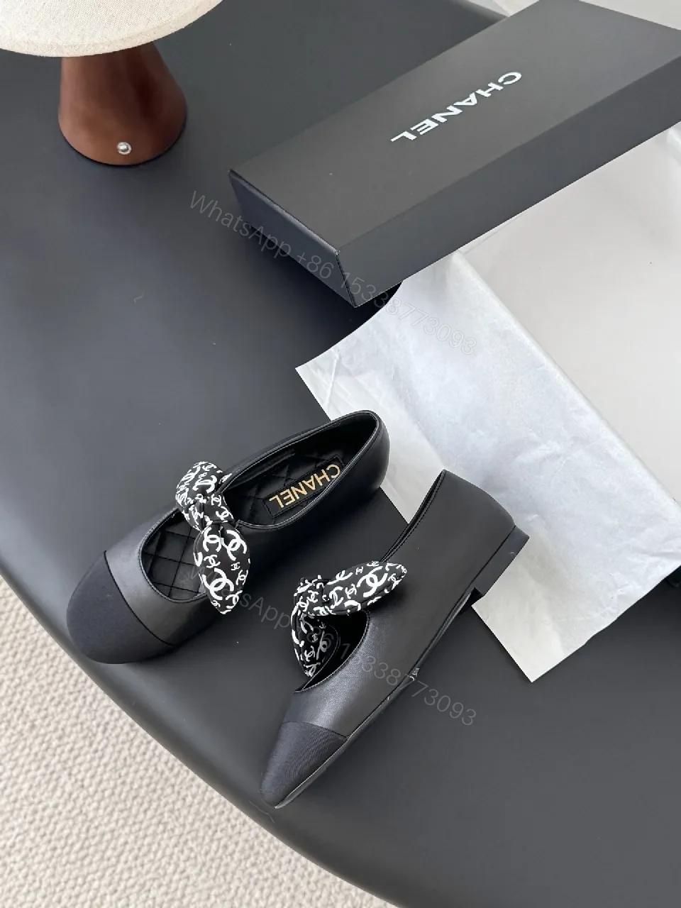 View 9 of Black Quilted Ballet Flats with Logo Bow - Chic, Comfortable Flats