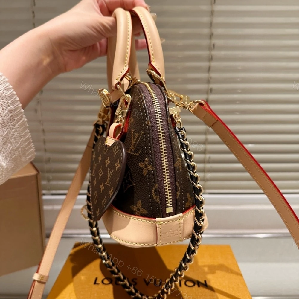 View 5 of Louis Vuitton Alma Mini LV And I Monogram Brown 25Cm K00016