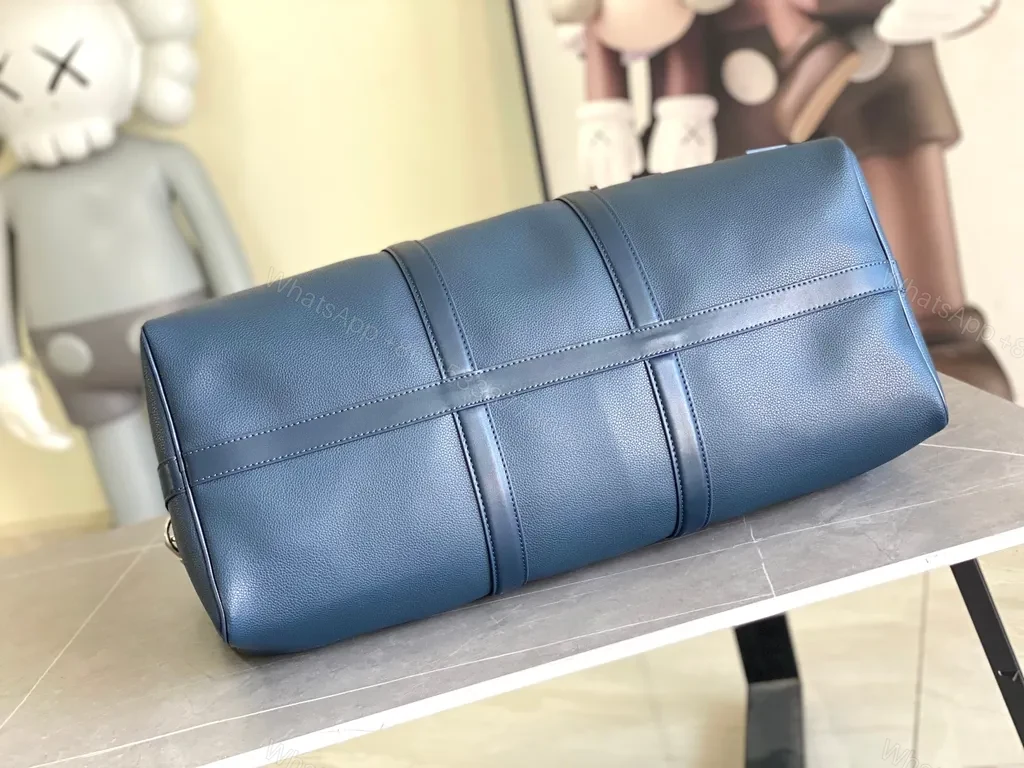 View 8 of Bold Blue Duffle Bag: Pebble Leather-Inspired Luxury Carryall