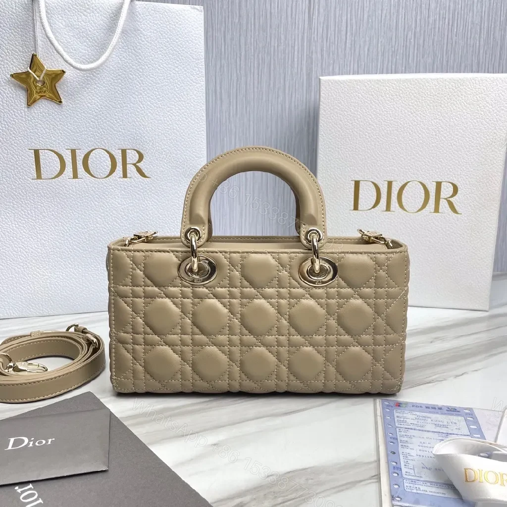 View 4 of Nude Calfskin Quilted Mini Handbag—Top Handle, Dior Hardware
