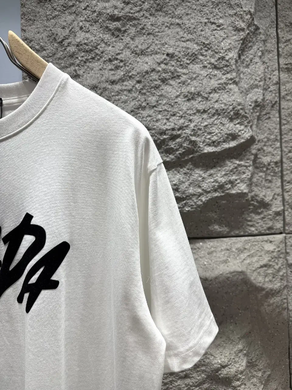 View 8 of Chic Bold Logo Cotton Tee – Modern Streetwear Fusion