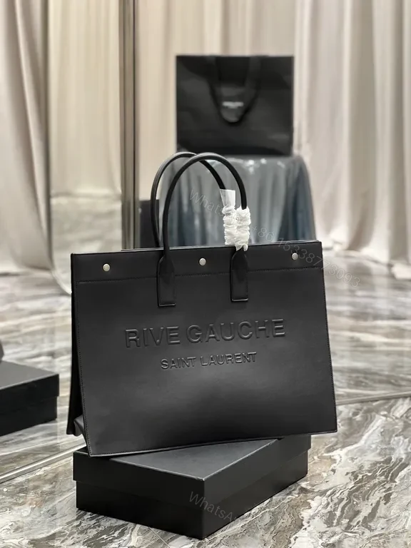 View 2 of Structured Minimalism: Leather Tote with Embossed Branding (60)