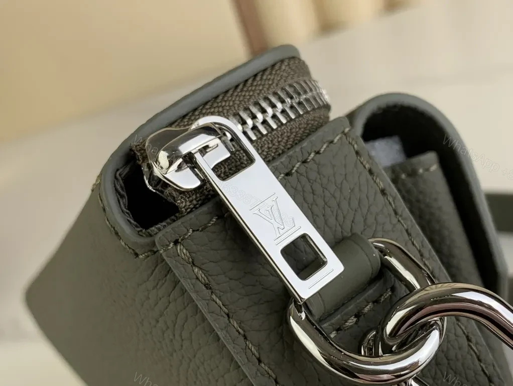 View 9 of Quiet Luxe Compact Crossbody: Pebbled Leather, LV Logo, Gold Hardware
