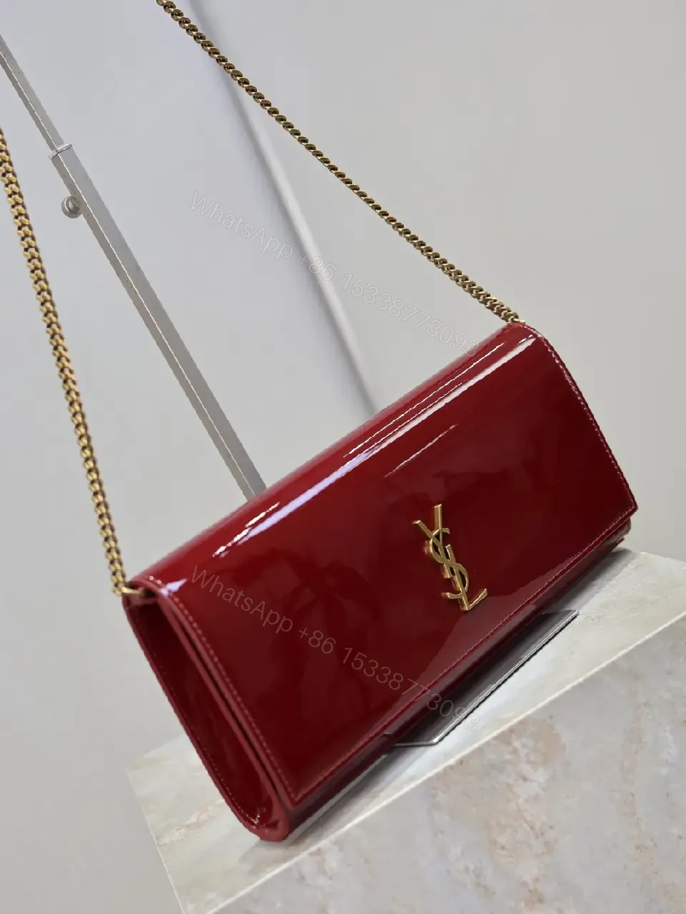 View 9 of Elegant Red Patent Crossbody, Structured & Versatile Bag