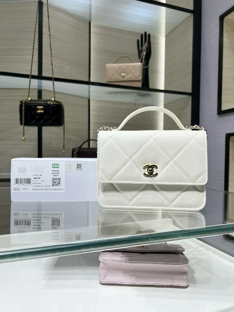 White Quilted Mini Bag: Gold Logo, Structured Luxury, Compact — view 1