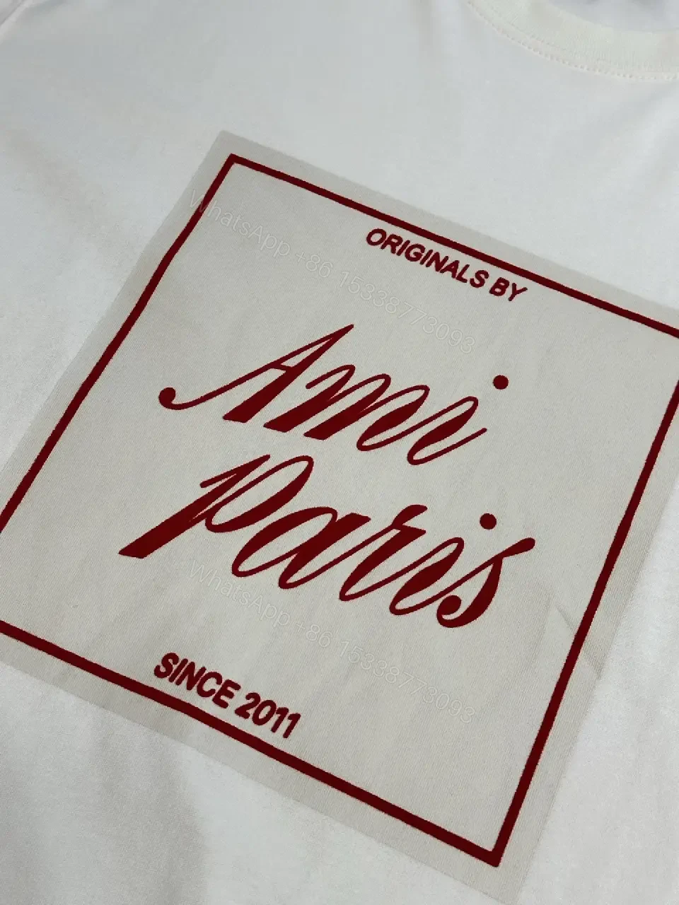 View 6 of Paris Flair Tee: Off-White Cotton Blend, Minimal Crest Graphic