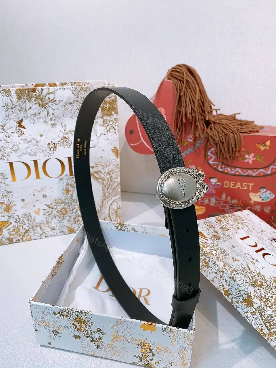 View 2 of Refined Black Leather Belt with Signature Coin Buckle