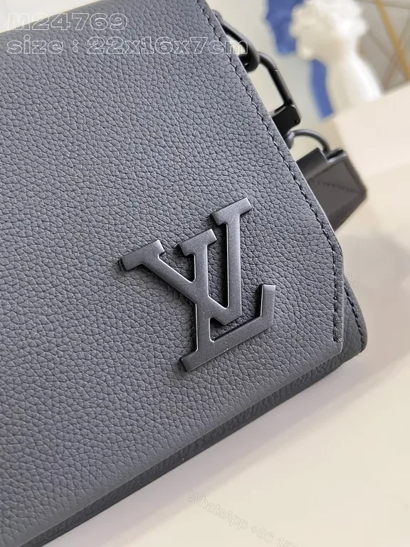 View 7 of Chic Compact Messenger: Luxury Leather, Subtle LV Emblem