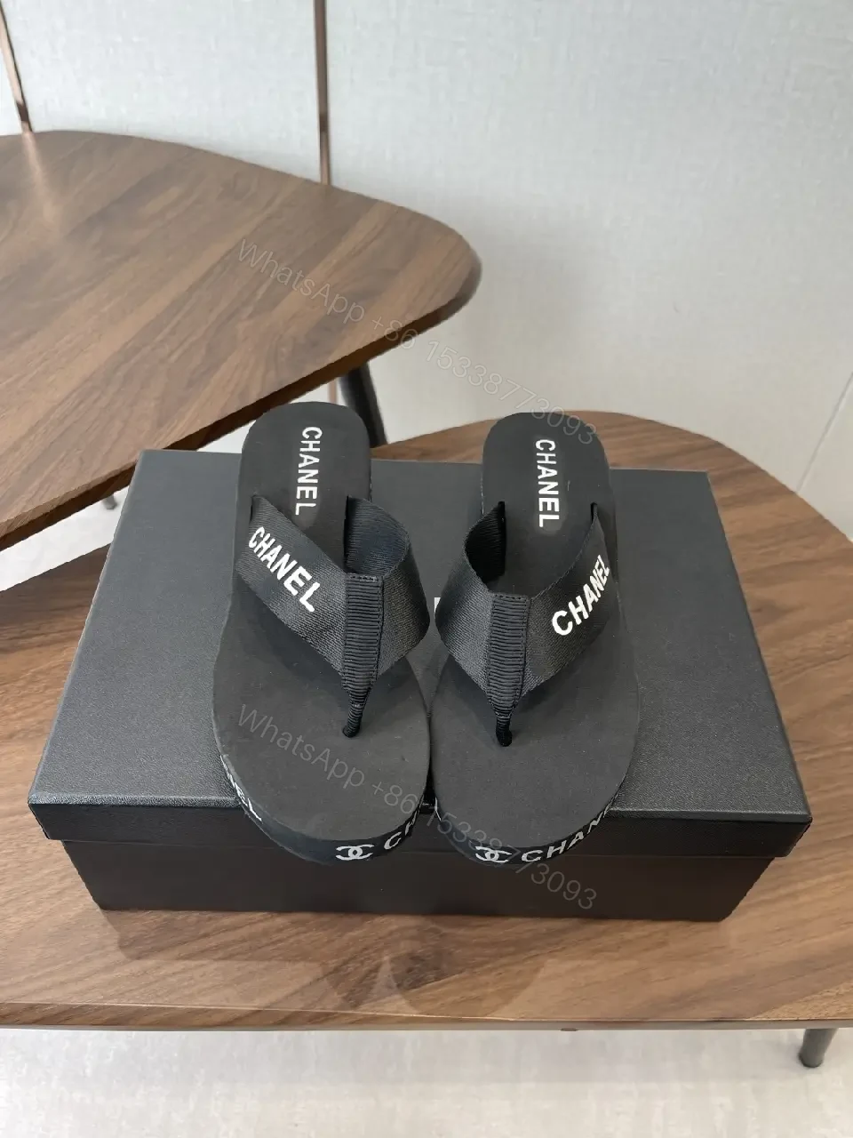 View 9 of Minimalist Black Luxe: Couture-Inspired Flip-Flops with Subtle Logo