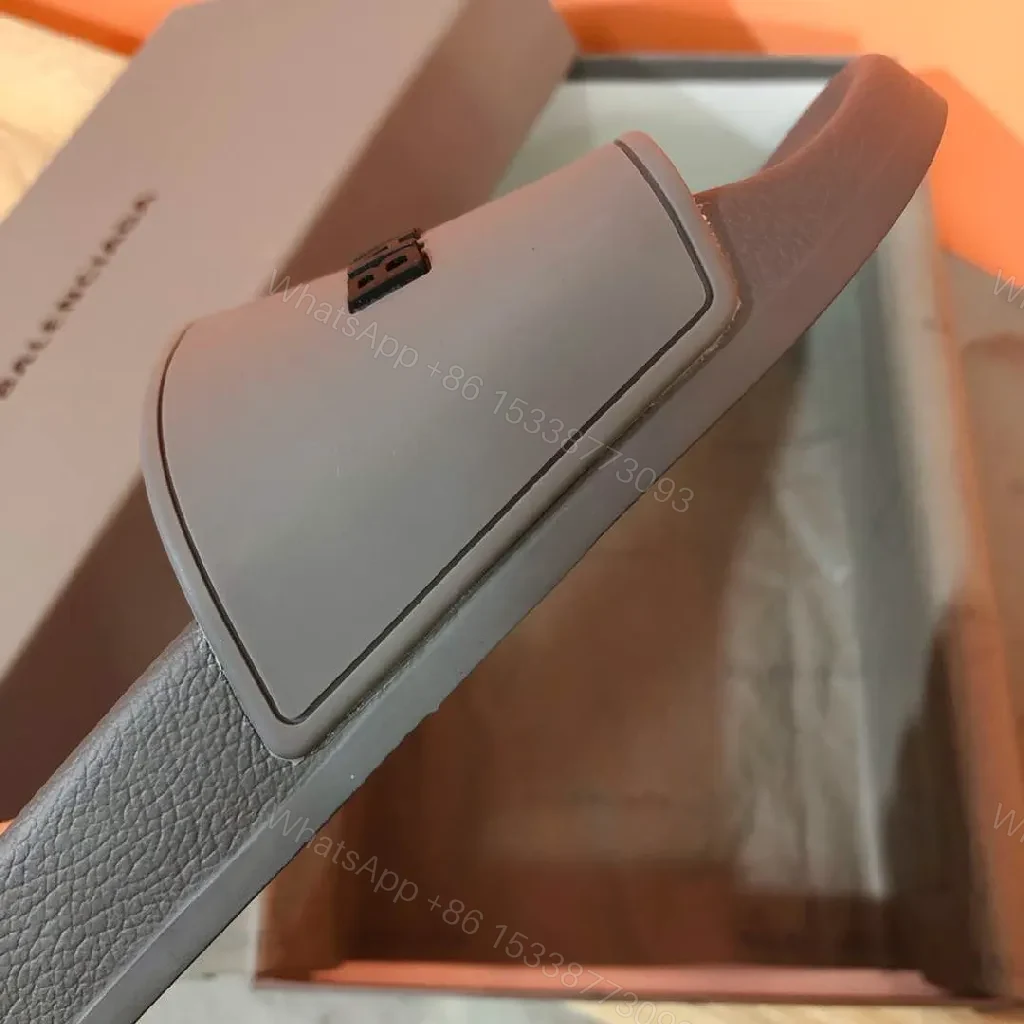 View 7 of Minimalist Designer Slides in Neutral Faux Leather with Bold Logo Strap