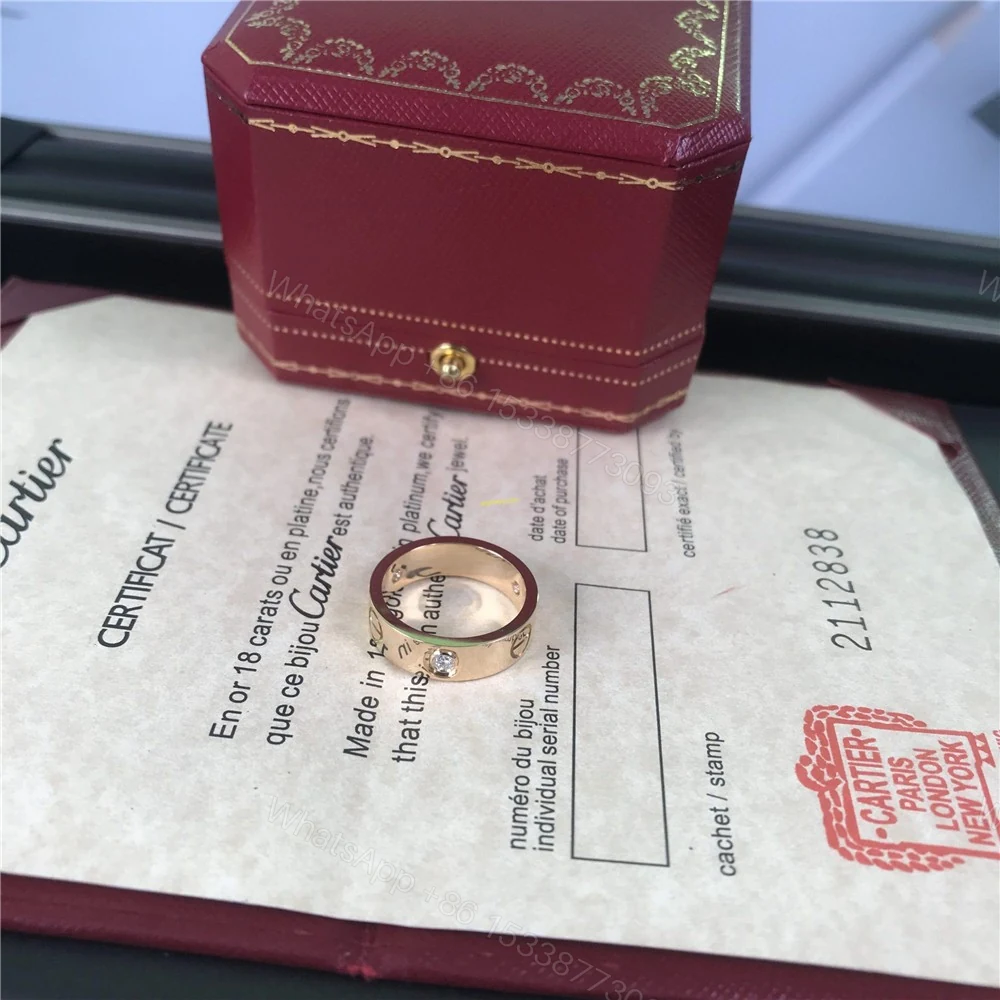 View 2 of Cartier Love Ring 3 Diamonds 5.5mm Yellow Gold B4032452