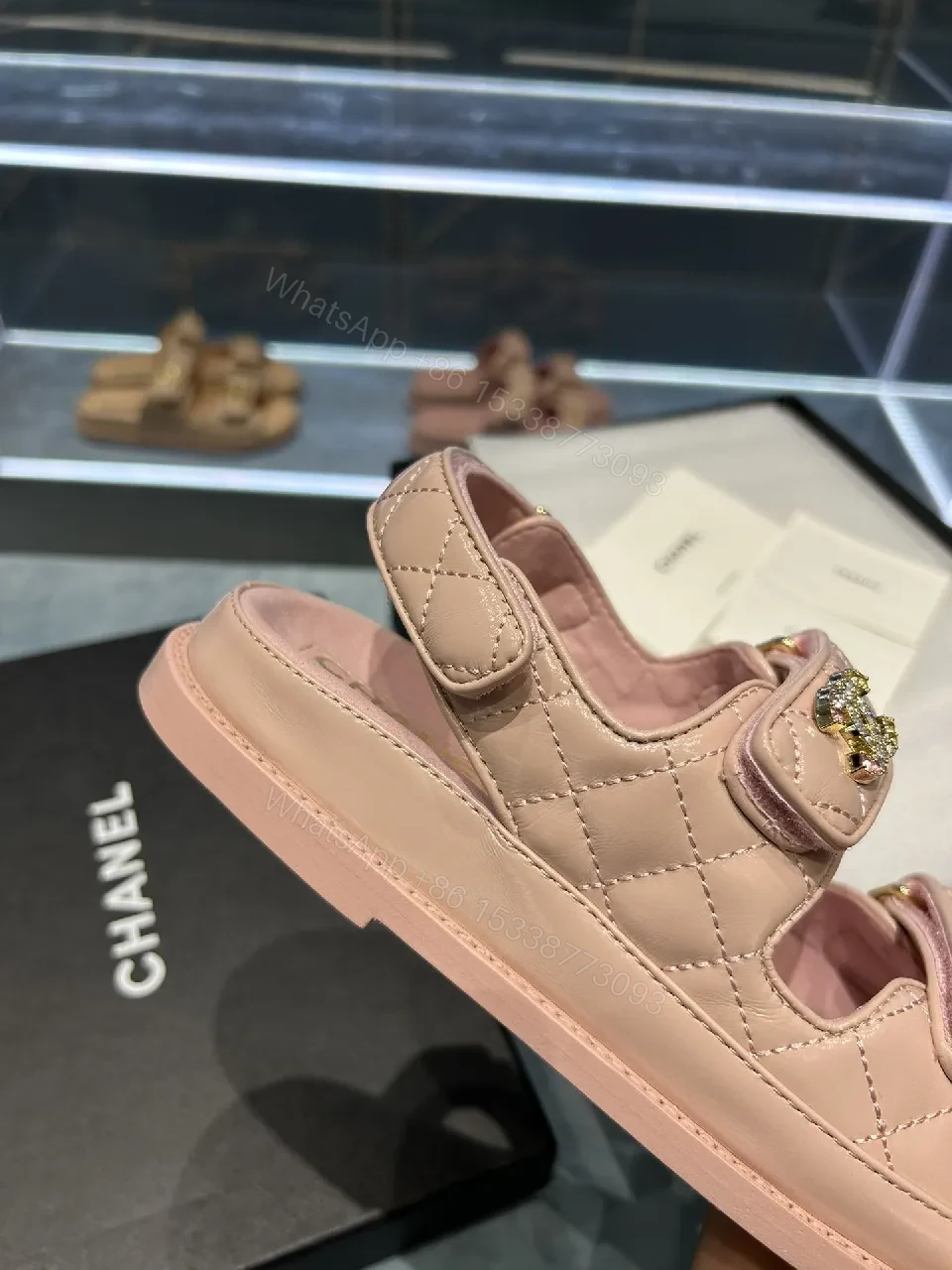 View 7 of Soft Pink Quilted Sandals with Gold Emblem Embellishment