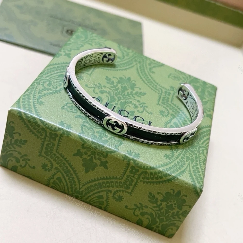 View 2 of GUCCI CUFF BRACELET INTERLOCKING GG STERLING SILVER BLACK ENAMEL