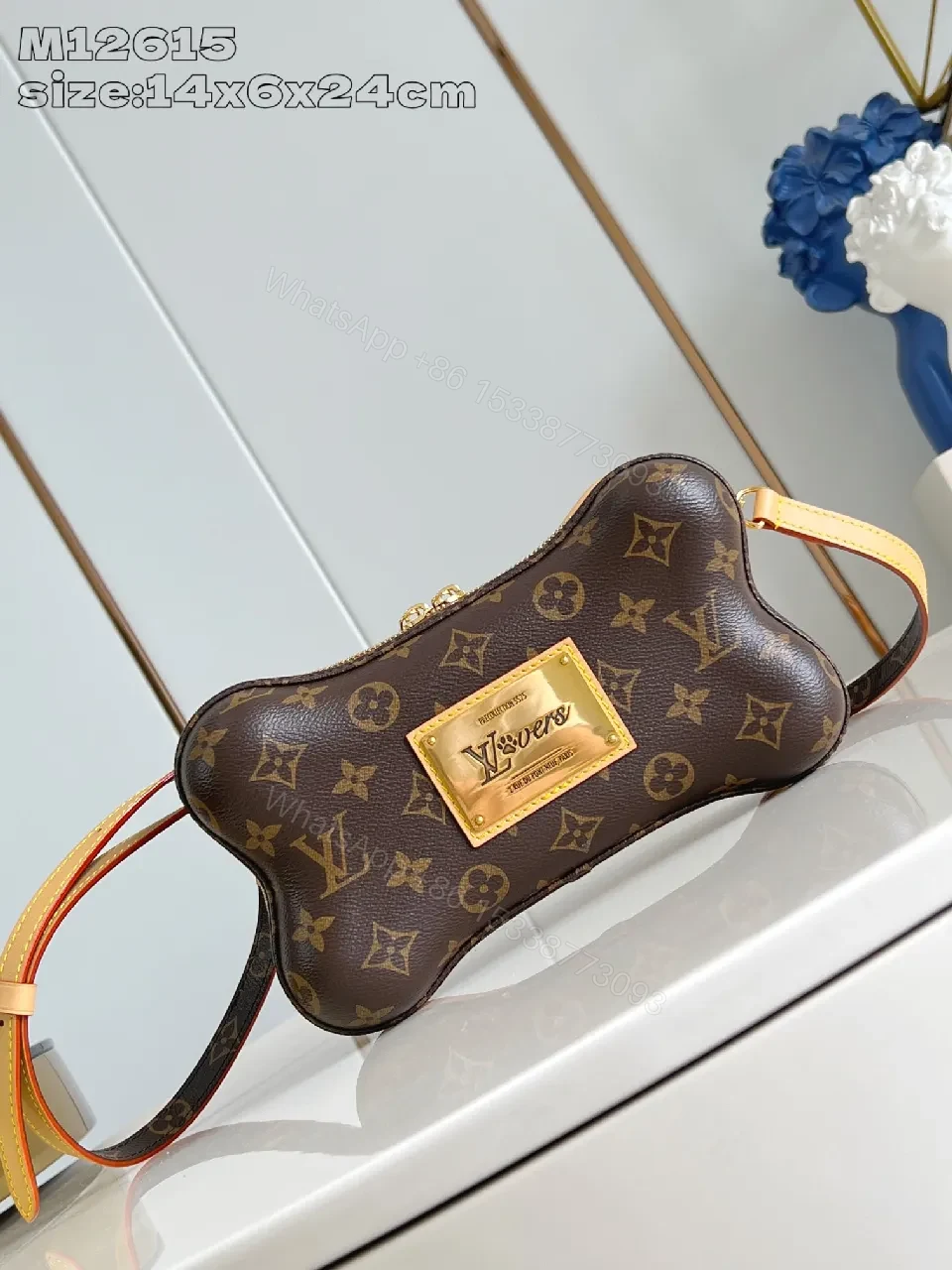 Monogram Canvas Bone Bag: Luxe Everyday Chic — view 1