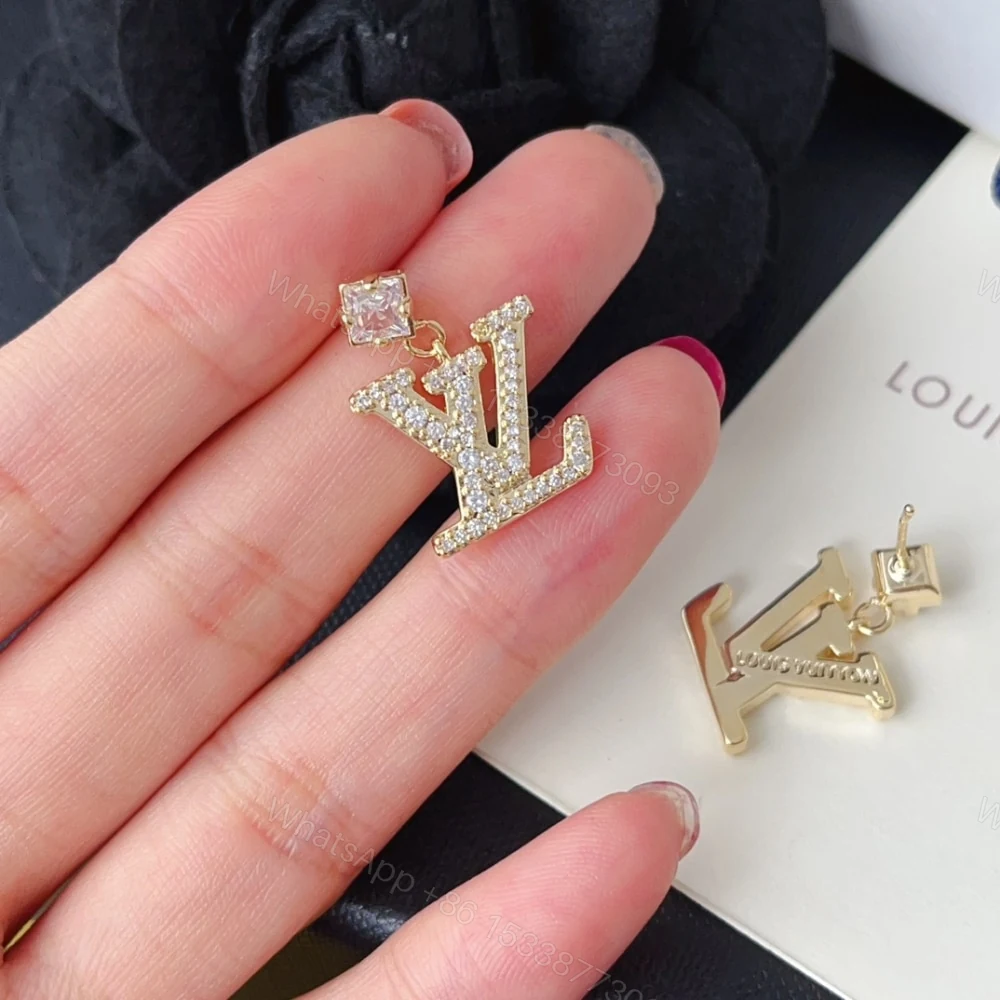 View 2 of LOUIS VUITTON LADY LV EARRINGS GOLD TONE M01844
