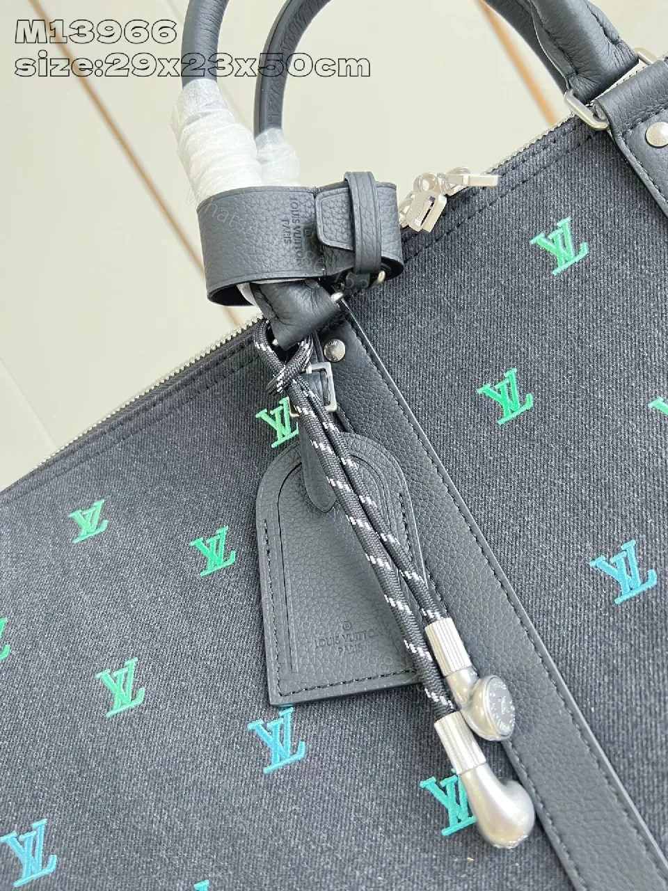 View 6 of Bold Denim Travel Bag with Multicolor Monogram Details