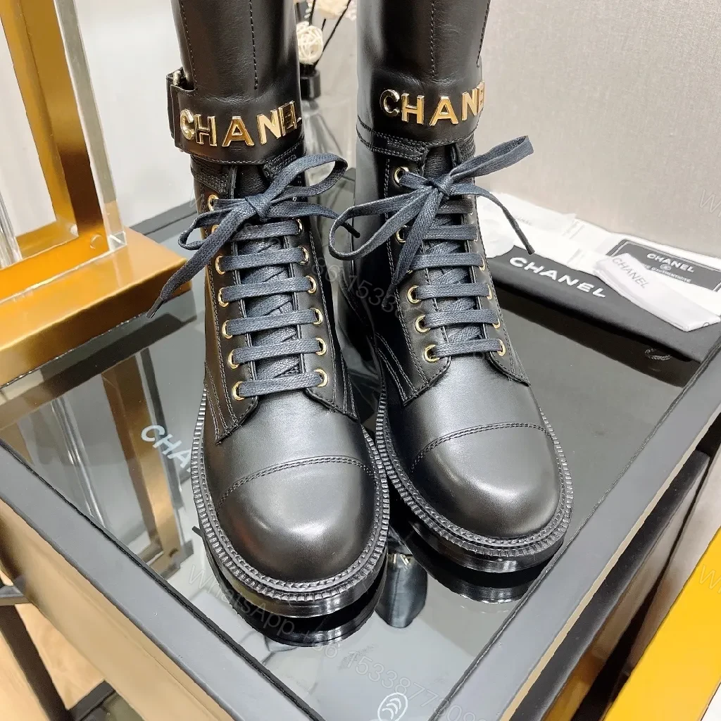 View 5 of Black Leather Combat Boots with Gold Hardware, Lug Sole, Cushioned Comfort