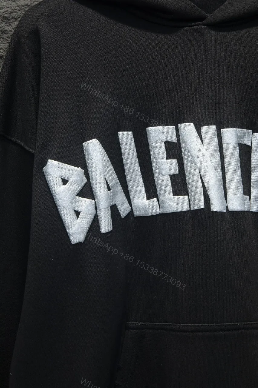 View 4 of Bold Logo Hoodie: Metallic Silver Logo, Oversized Comfort