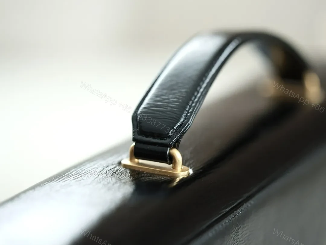 View 7 of Compact Quilted Leather Handbag with Gold Hardware