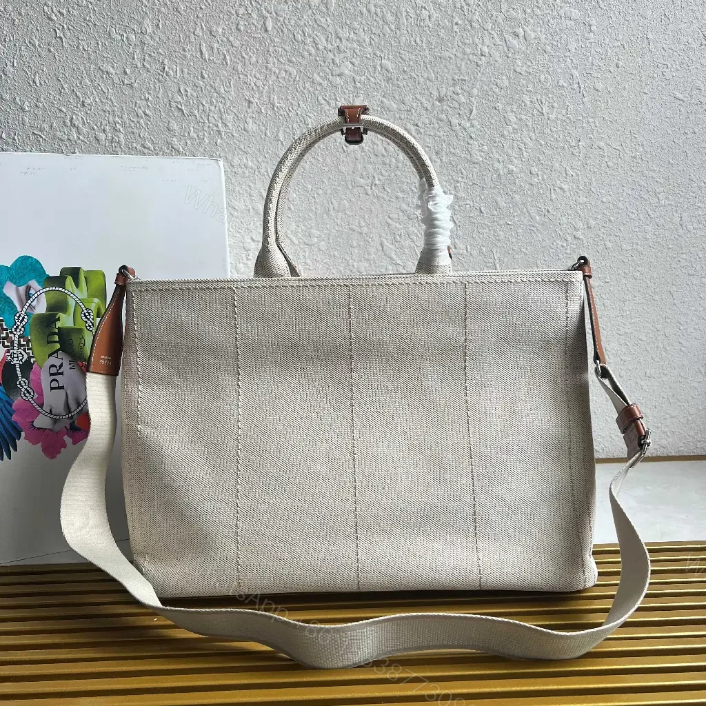 View 6 of Light Beige Canvas Tote Bag with Leather Accents and Structured Silhouette